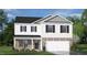 Two-story home with stone and vinyl siding, two-car garage at 65 Ethel Ln, Angier, NC 27501