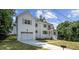 Two story white house with attached garage at 2801 Ashland St, Raleigh, NC 27608