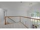 Bright hallway with a chandelier and carpeted floor at 111 N Coslett Ct, Cary, NC 27513
