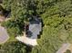 House nestled amongst lush greenery, seen from above at 111 N Coslett Ct, Cary, NC 27513