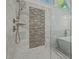 Walk-in shower with mosaic tile and rainfall shower head at 111 N Coslett Ct, Cary, NC 27513
