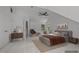 Main bedroom with large bed and en-suite bathroom at 111 N Coslett Ct, Cary, NC 27513