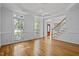 Formal dining room with hardwood floors and large windows at 111 N Coslett Ct, Cary, NC 27513