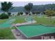 Enjoy a relaxing round of mini golf by the lake at 102 Mayan Dr, Louisburg, NC 27549
