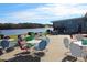 Enjoy waterfront views from the outdoor patio seating at 102 Mayan Dr, Louisburg, NC 27549