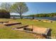 Cornhole and volleyball by the lake provide fun outdoor activities at 102 Mayan Dr, Louisburg, NC 27549