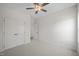 Bright bedroom with double door closet and fan at 63 Falls River Ct, Broadway, NC 27505