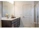 Clean bathroom with double vanity and walk-in shower at 616 Beaminster Pl, Fuquay Varina, NC 27526