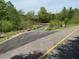 Walking trail intersection with a footbridge at 4929 Trout Crest Court, Raleigh, NC 27604