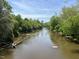 Calm river flowing through wooded area at 4929 Trout Crest Court, Raleigh, NC 27604