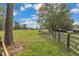 Serene pasture with horses and barn in the background at 1100 Branch Chapel Church Rd, Selma, NC 27576