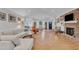 Open living room with hardwood floors, vaulted ceiling and fireplace at 1100 Branch Chapel Church Rd, Selma, NC 27576