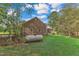 Brick home with propane tank and spacious backyard at 1100 Branch Chapel Church Rd, Selma, NC 27576