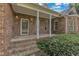 Brick porch with white columns and landscaping at 1100 Branch Chapel Church Rd, Selma, NC 27576