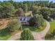Aerial view of a home with a circular driveway and large backyard at 1100 Branch Chapel Church Rd, Selma, NC 27576
