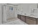 Elegant bathroom with marble shower and double vanity at 1100 Branch Chapel Church Rd, Selma, NC 27576