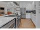 Modern kitchen with stainless steel appliances and a large island at 1100 Branch Chapel Church Rd, Selma, NC 27576