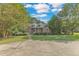 Brick ranch house with a circular driveway at 1100 Branch Chapel Church Rd, Selma, NC 27576