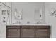Modern bathroom with double vanity and walk-in shower at 1100 Branch Chapel Church Rd, Selma, NC 27576