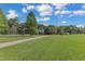 Brick home with a long driveway and expansive lawn at 1100 Branch Chapel Church Rd, Selma, NC 27576