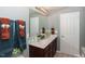 Double vanity bathroom with modern finishes at 700 Quail Ct, Creedmoor, NC 27522
