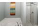 Relaxing bathroom with soaking tub and separate shower at 700 Quail Ct, Creedmoor, NC 27522