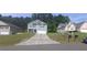 Gray two-story house with a double garage at 700 Quail Ct, Creedmoor, NC 27522