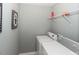 Convenient laundry room with washer, dryer, and shelving at 700 Quail Ct, Creedmoor, NC 27522