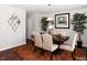 Formal dining room with a large table and six chairs at 700 Quail Ct, Creedmoor, NC 27522