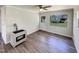 Living room with wood-look floors and gas fireplace at 225 W Orange St, Hillsborough, NC 27278