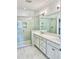 Double vanity bathroom with frameless shower at 15 Bella Ln, Zebulon, NC 27597