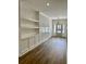 Bright entryway with built-in shelving and wood flooring at 15 Bella Ln, Zebulon, NC 27597