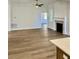Living room with hardwood floors and access to kitchen at 15 Bella Ln, Zebulon, NC 27597