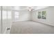 Bright bedroom with ceiling fan and plush carpeting at 817 Leatherstone Ln, Fuquay Varina, NC 27526