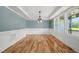 Formal dining room with hardwood floors and light blue walls at 2804 Jack Mitchell Rd, Zebulon, NC 27597