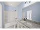 Bathroom with granite countertop, single sink, and tub at 2804 Jack Mitchell Rd, Zebulon, NC 27597