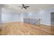 Spacious bonus room with hardwood floors and ceiling fan at 2804 Jack Mitchell Rd, Zebulon, NC 27597