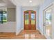 Bright entryway with hardwood floors and double wooden doors at 2804 Jack Mitchell Rd, Zebulon, NC 27597