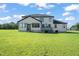 Two story house exterior with gray siding, green lawn at 2804 Jack Mitchell Rd, Zebulon, NC 27597