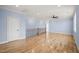 Bright bonus room featuring hardwood floors and a ceiling fan at 2804 Jack Mitchell Rd, Zebulon, NC 27597