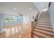 Open living room with hardwood floors, built-in shelving, and fireplace at 2804 Jack Mitchell Rd, Zebulon, NC 27597