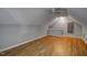 Bonus room with hardwood floors and ceiling fan at 12417 Fieldmist Dr, Raleigh, NC 27614