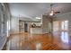 Open kitchen with island and hardwood floors at 12417 Fieldmist Dr, Raleigh, NC 27614