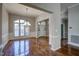 Bright dining room featuring hardwood floors and a chandelier at 12417 Fieldmist Dr, Raleigh, NC 27614