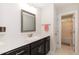 Modern bathroom with dark vanity and white countertop at 159 Shady Oaks Dr, Benson, NC 27504
