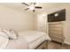Spacious bedroom with a dresser and ceiling fan at 159 Shady Oaks Dr, Benson, NC 27504