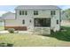 Two-story house with screened porch, patio, and fenced backyard at 159 Shady Oaks Dr, Benson, NC 27504