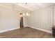 Spacious dining room with hardwood floors and decorative wall treatments at 159 Shady Oaks Dr, Benson, NC 27504