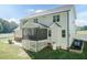 Two-story house with screened porch, patio, and fenced backyard at 159 Shady Oaks Dr, Benson, NC 27504