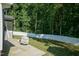 Spacious backyard with privacy fence and wooded area at 159 Shady Oaks Dr, Benson, NC 27504